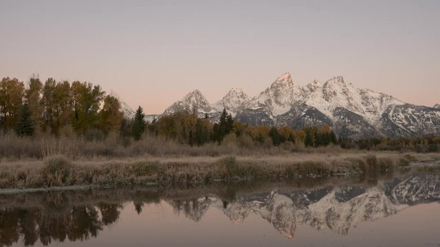 Morning timelapes of the Snake River at Schwabacher Landing in Grand Teton National Park during a fall morning in Wyoming.