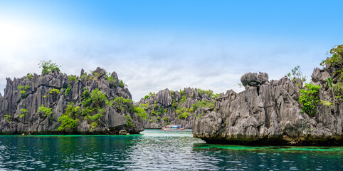 Twin Lagoon on paradise island with sharp limestone rocks, tropical travel destination - Coron,...