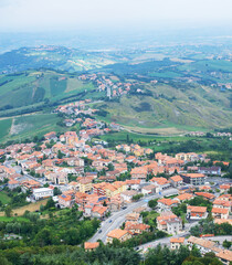 Fototapeta na wymiar The view of city from the mountain, San Marino.