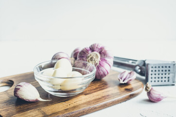 Rustic style garlic on vintage wooden background