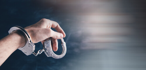 men handcuffed in criminal concept