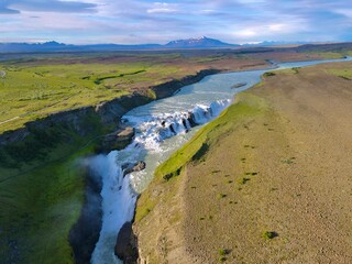 Fototapeta na wymiar Unbelievably amazing waterfalls in the Icelandic countryside