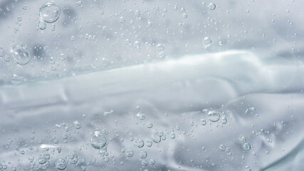 Obraz premium Close up macro Aloe vera gel cosmetic texture white background with bubbles. Lemongrass gel skincare product. antibacterial liquid with aloe vera, moisturizing. Safe and environmental friendly.