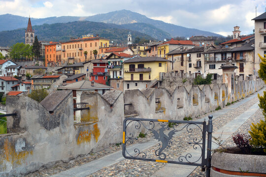 Dronero, Piedmont, Italy View of the old village in Val Maira  ftom the medieval  bridge