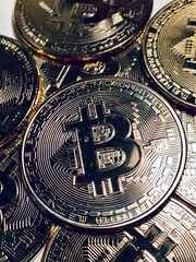 Golden bitcoin background, bitcoin is most popular crypto currency with copy space