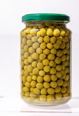 Raw peas packaged in glass jar