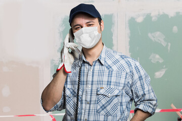 Worker talking on the phone © Minerva Studio