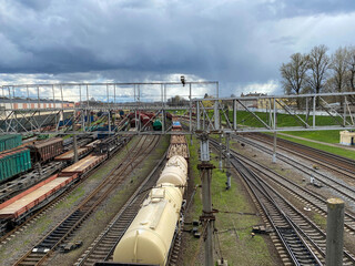 Top view of railway wagon on сargo terminal. Metal railway open wagon for transportation of bulk...