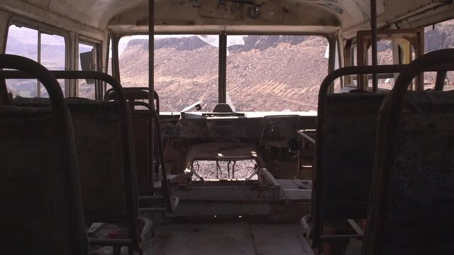 inside old bus sits 5