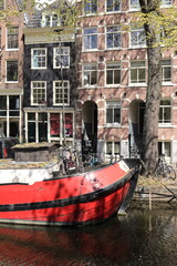 Amsterdam Raamgracht Canal View with House Facades, Red Boat and Elm Tree Blossom
