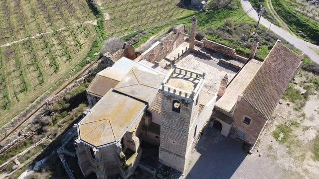 View from drone of ancient ruined monastery of Avinganya near Catalan city of Seros on spring sunny day, Spain