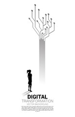 Silhouette of businesswoman standing with tree from dot connect line circuit. concept of digital transformation of business.