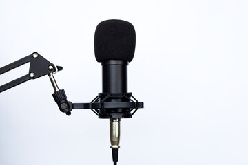 Studio microphone on white background.