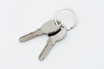 Close up of keys on white background.