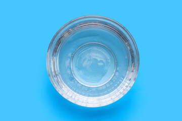 White vinegar on blue background.