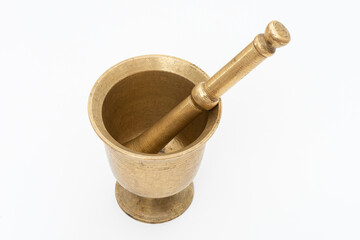 Antique and mged pestle and mortar on the white background.