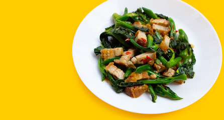 Stir fried chinese kale with crispy pork belly