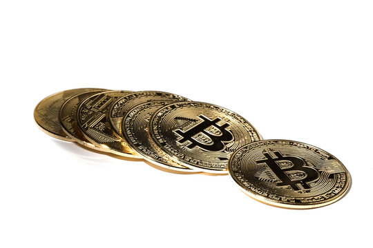 Bitcoin coins are isolated on a white background.
