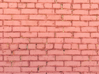 brick block wall painted red and weathered or garden building structure