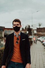  businessman wearing medical mask at the street