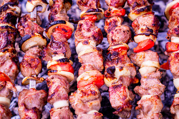 Barbecue. Fresh meat, put on a skewer, is fried over hot coals. Close-up. Shashlik.