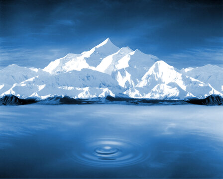 Blue photo montage of a lake with white mountains in the background