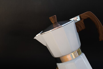 Italian moka pot isolated on black background