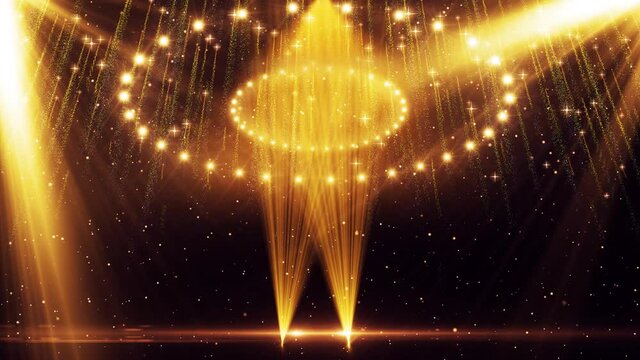 Golden particles shine in the background of the Oscars