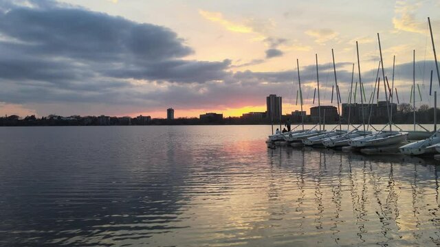 beautiful sunset seen from a tiny lake pier in minneapolis minnesota, travel explore mn