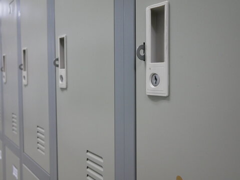 closeup of locker cabinets in a locker room.
