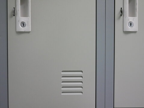 closeup of locker cabinets in a locker room.
