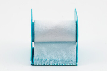 a micropore surgical tape with handle isolated on white background