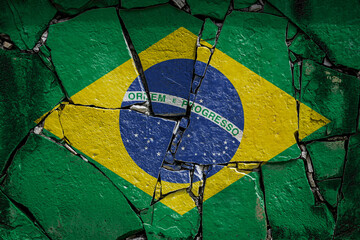 National flag of Brazil. depicting in paint colors on an old stone wall. Flag  banner on broken ...