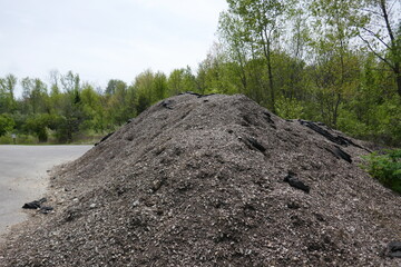 Large dirt mound in public park area