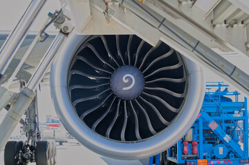 A large jet engine and fan blades