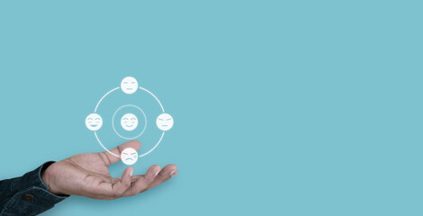 Hand choose smile face icon, positive thinking, mental health assessment , world mental health day concept	