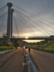 Tokyo,Japan-May 3, 2021: Ipponsugi-bashi bridge at sunrise in Tama city, Tokyo, Japan
 - obrazy, fototapety, plakaty