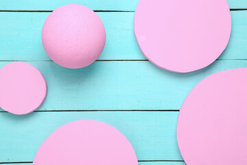 Geometric shapes. Circle on a blue wooden background. Top view. MInimalism. Fresh idea