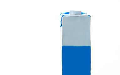 Box of whole milk on white illuminated background