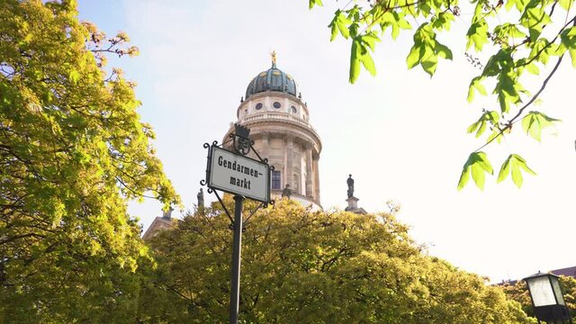 Romantic Scenery of Famous Gendarmenmarkt in Berlin with Historic Sign