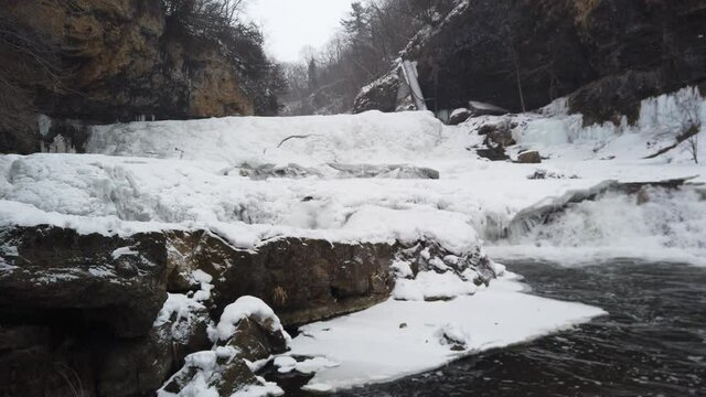 Willow river state park in Wisconsin, water falls snow in winter time