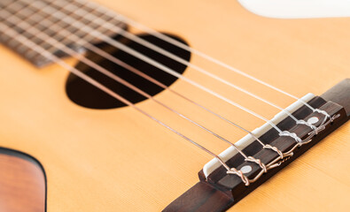 Fototapeta na wymiar wooden guitar strings closeup