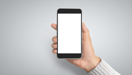 Hand holding smartphone device touching screen