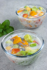 Es campur hongkong or Ximilu ice, made of jelly, young coconut, sugar syrup, mixed fruits and coocnut milk or milk.