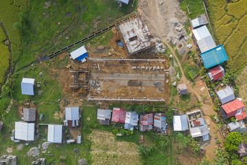 Fototapeta premium Amazing Aerial Drone Shot View of a Construction Site Building in the Provinces Island of the Philippines. Architectural and Industrial Building