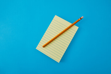 Notebook, empty notepad and new pencil