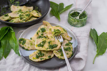 Pierogi ruskie, Baked dumplings stuffed with curd cheese and potatoes and wild garlic