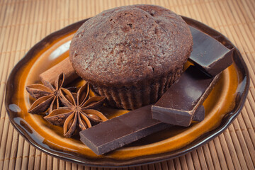 Fresh chocolate muffins on plate. Delicious dessert