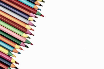 colored pencils on white background