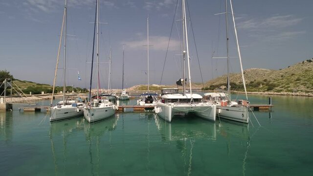 Aerial view of yachts, boats and sailboats moored at a marina